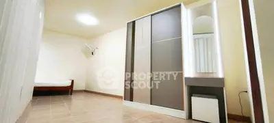 Spacious bedroom with modern wardrobe and minimalist design