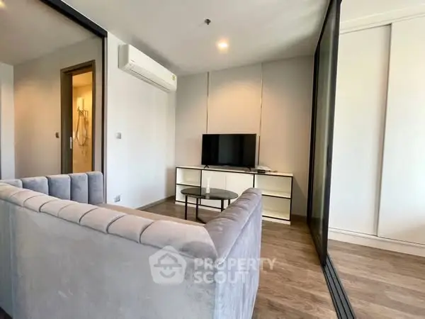 Modern living room with sleek design and cozy ambiance