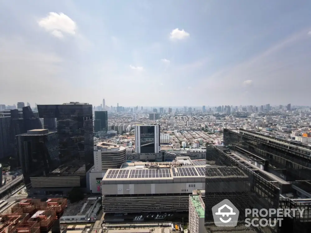 Stunning cityscape view from high-rise building showcasing urban skyline and architecture.