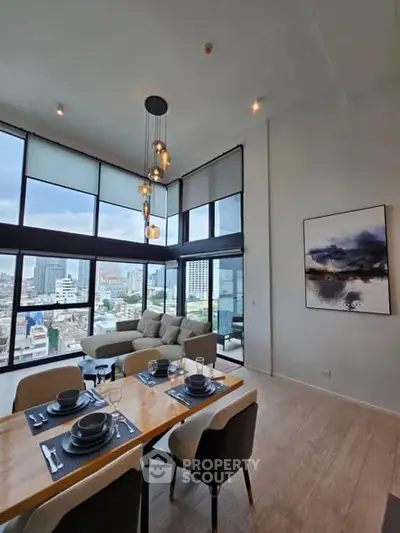 Stunning modern living room with floor-to-ceiling windows and city view