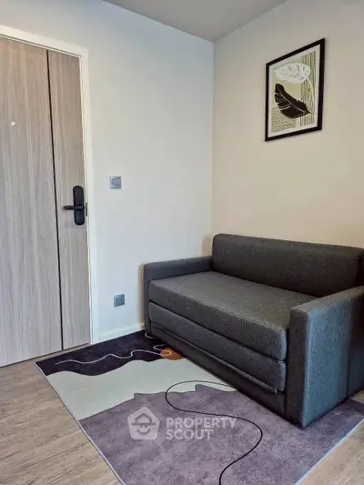 Cozy small living room with modern sofa and stylish decor