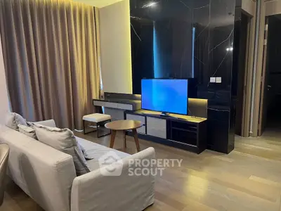 Modern living room with sleek TV setup and elegant decor
