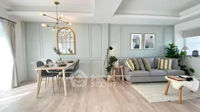 Stylish modern living room with elegant dining area and chic decor