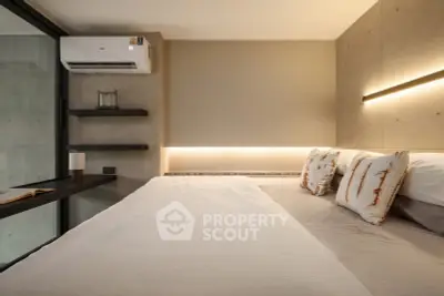 Modern bedroom with minimalist design and cozy lighting