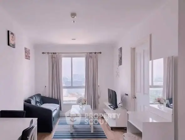 Bright and airy living room with modern decor and city view.