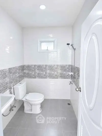 Modern bathroom with stylish tile design and sleek fixtures