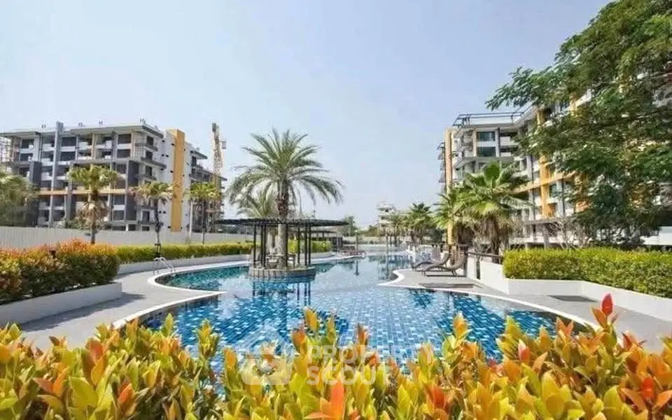 Luxurious residential complex with stunning pool and lush landscaping