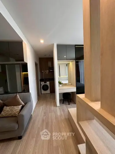 Modern living room with open layout and stylish wooden flooring