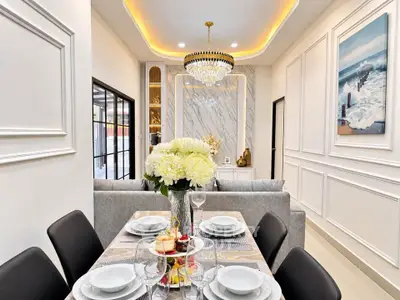 Luxurious dining room with elegant chandelier and modern decor