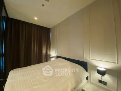 Modern bedroom with elegant lighting and cozy ambiance