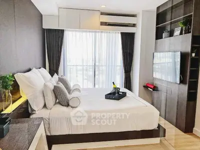 Luxurious modern bedroom with elegant decor and large window view