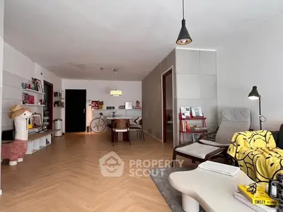 Spacious modern living room with stylish decor and open layout, perfect for relaxation and entertainment.