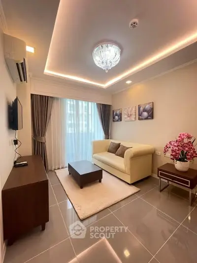 Elegant living room with modern decor and natural light