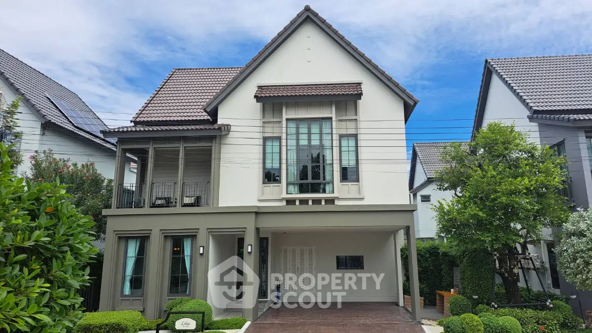 Charming two-story house with manicured garden and spacious driveway