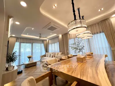 Luxurious living room with elegant lighting and wooden dining table