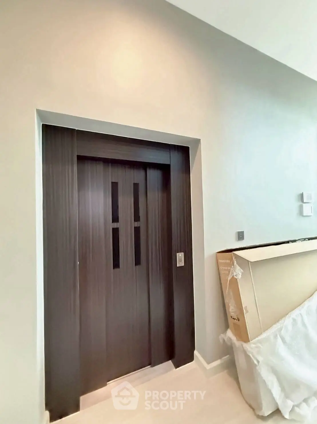 Modern elevator in a sleek residential building interior