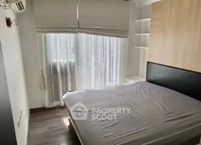 Cozy bedroom with natural light and modern design