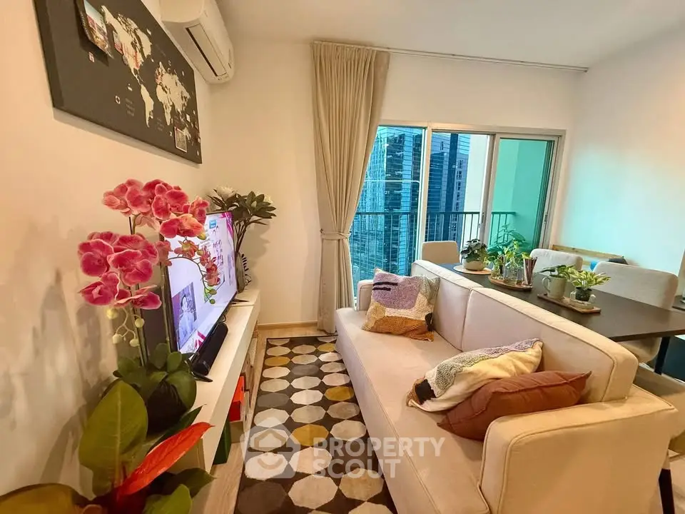Chic living room with modern decor and balcony view in urban apartment