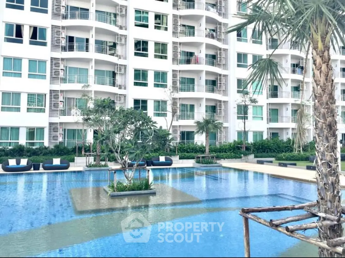 Luxurious condominium with stunning pool and modern architecture