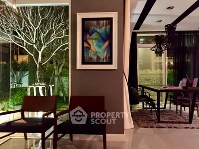 Modern interior with elegant dining area and artistic wall decor