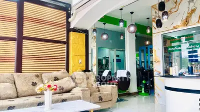 Stylish salon interior with modern decor and comfortable seating area