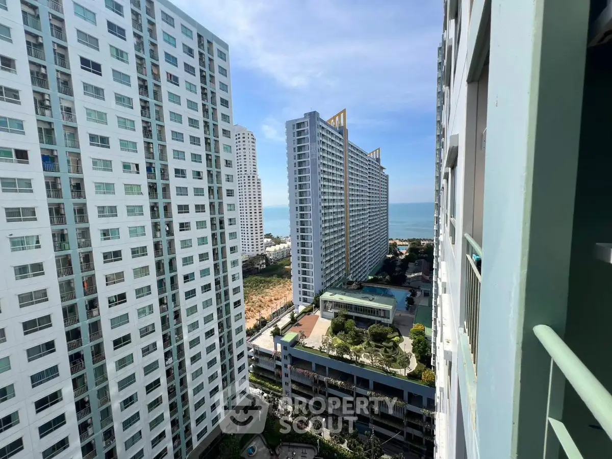 Stunning high-rise ocean view from a modern apartment balcony