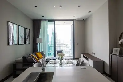 Modern living room with city view and stylish decor in luxury apartment