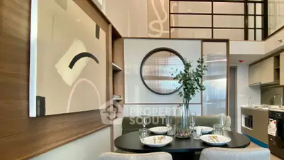 Modern dining area with stylish decor and open kitchen layout