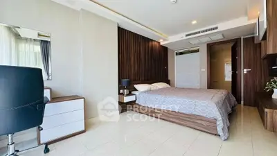 Modern bedroom with stylish wood paneling and sleek furniture design
