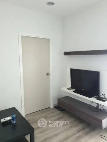 Modern living room with sleek TV setup and minimalist decor
