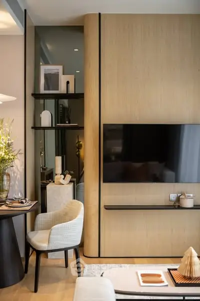 Modern living room with sleek TV setup and elegant decor