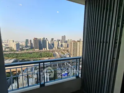 Stunning cityscape view from a high-rise balcony, perfect for urban living enthusiasts.