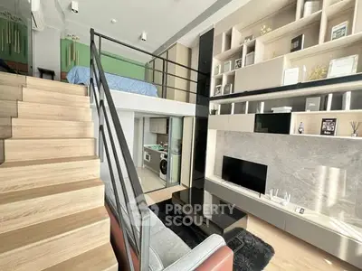 Modern loft apartment with stylish living area and mezzanine bedroom