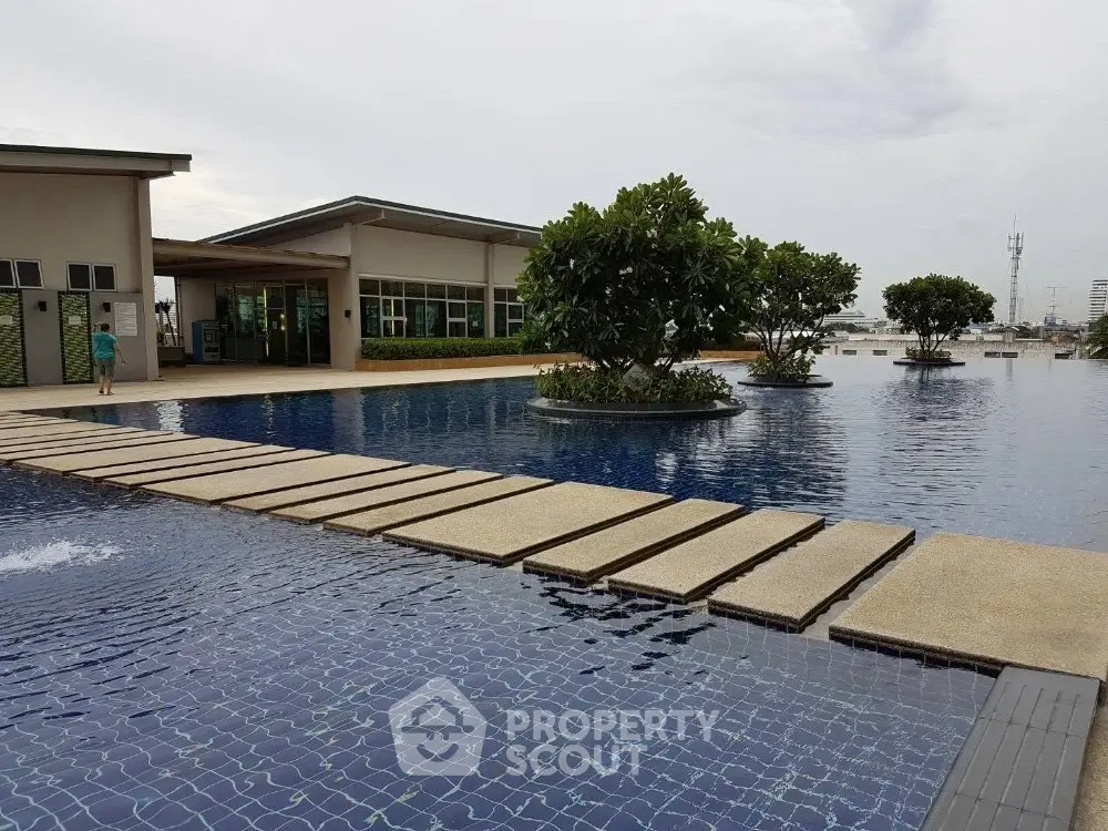 Luxurious rooftop pool with scenic view and modern design, perfect for relaxation and leisure.