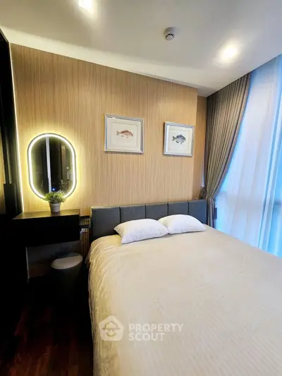 Cozy bedroom with modern decor and ambient lighting, featuring a stylish bed and elegant curtains.