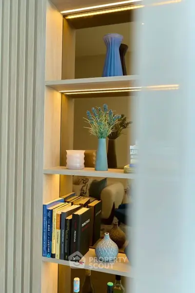 Stylish modern living room with elegant shelving and decorative accents