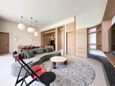 Spacious modern living room with stylish furniture and open layout