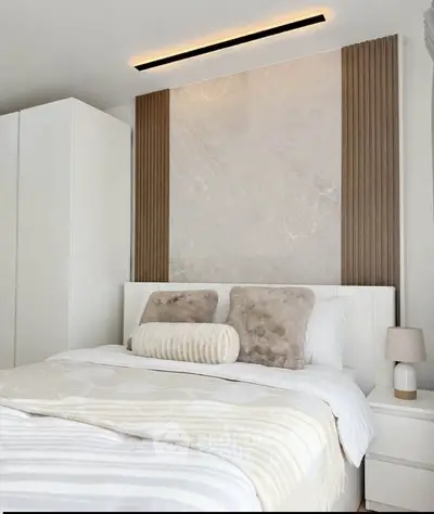 Luxurious modern bedroom with elegant decor and cozy ambiance