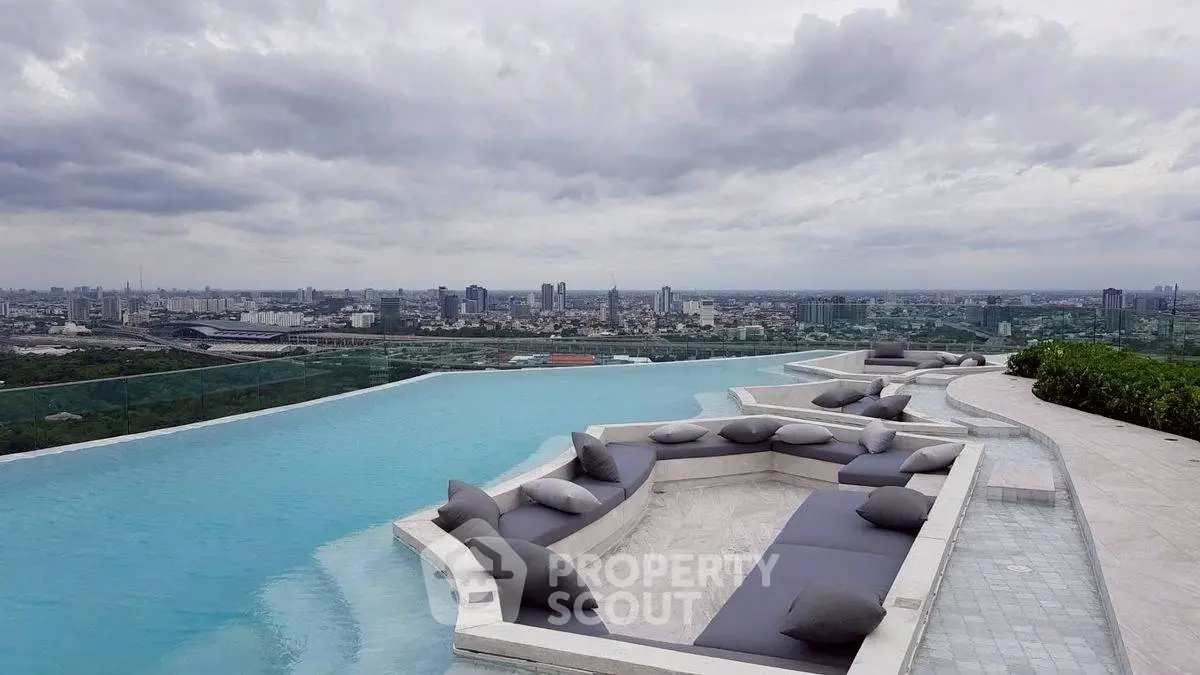 Luxurious rooftop infinity pool with stunning city skyline view