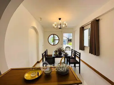 Charming dining area with elegant decor and natural light, perfect for intimate gatherings.