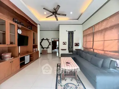 Spacious living room with modern decor and large sectional sofa