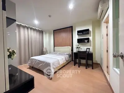 Modern bedroom with elegant decor and cozy ambiance, featuring a comfortable bed and stylish furnishings.