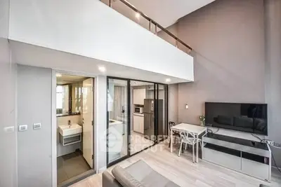 Modern duplex apartment with sleek interior design and open living space