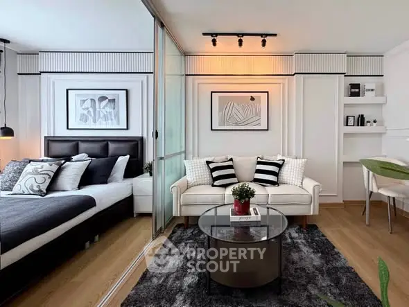 Modern studio apartment with stylish decor and cozy living area