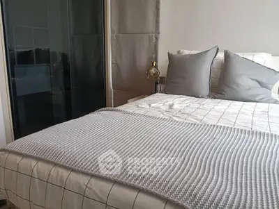 Cozy modern bedroom with stylish bedding and soft lighting