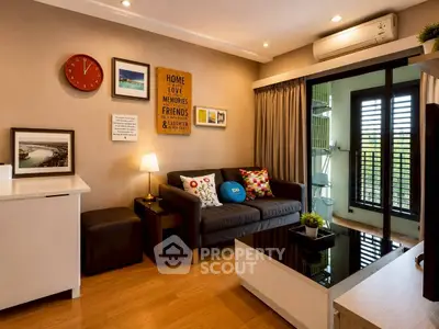 Stylish living room with modern decor and balcony access, featuring cozy seating and ambient lighting.