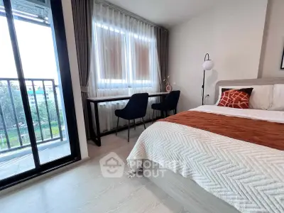 Modern bedroom with balcony view and stylish decor in urban apartment