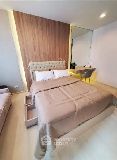 Modern bedroom with stylish decor and cozy ambiance