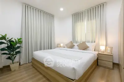 Modern bedroom with cozy decor and natural light