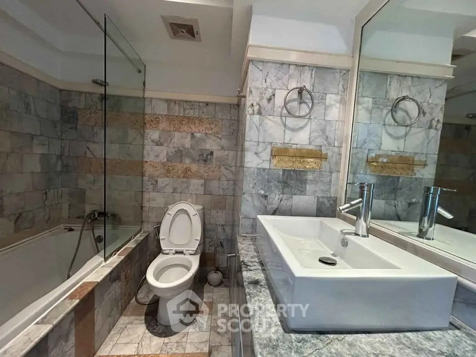 Luxurious marble bathroom with modern fixtures and elegant design